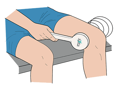 Picture of a person using Magnetic Pulser on knee