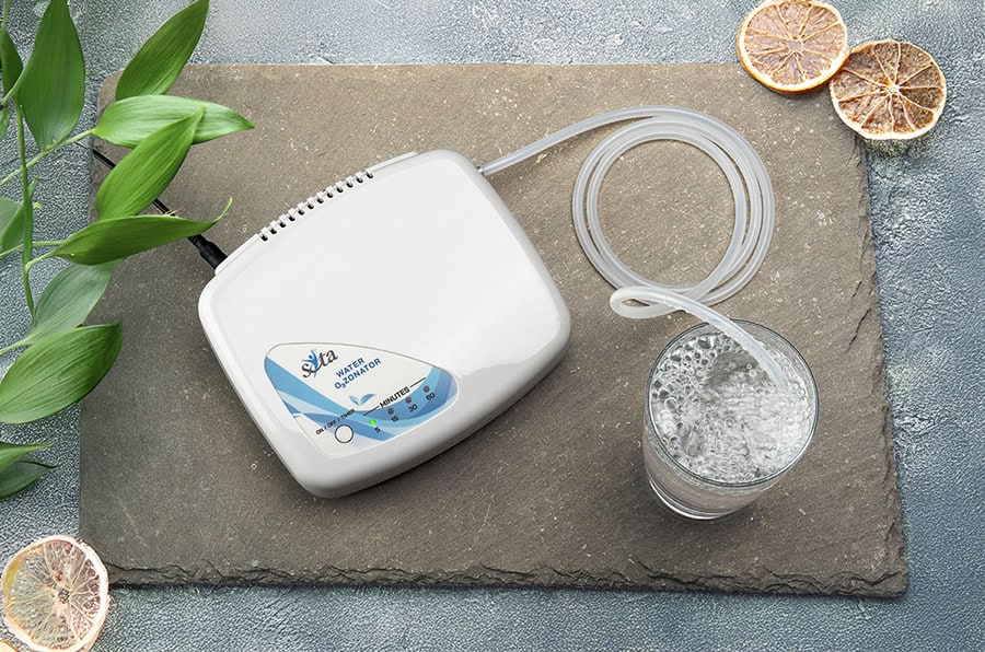 Ozonating water beside a plant
